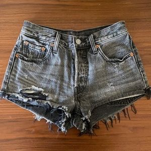 Levi’s 501 Black Shorts with distress